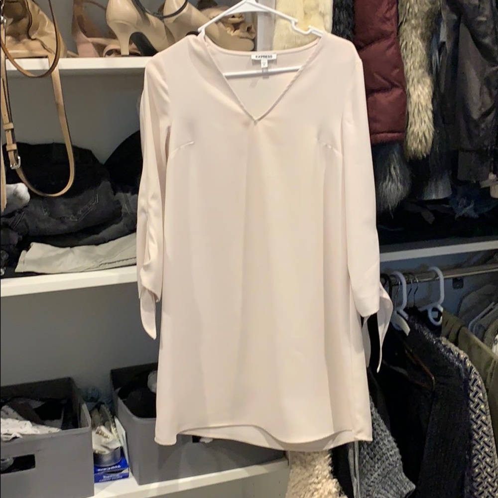 Nude pink flowy dress with tie bell sleeves